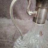 Glass and silver metal wine carafe