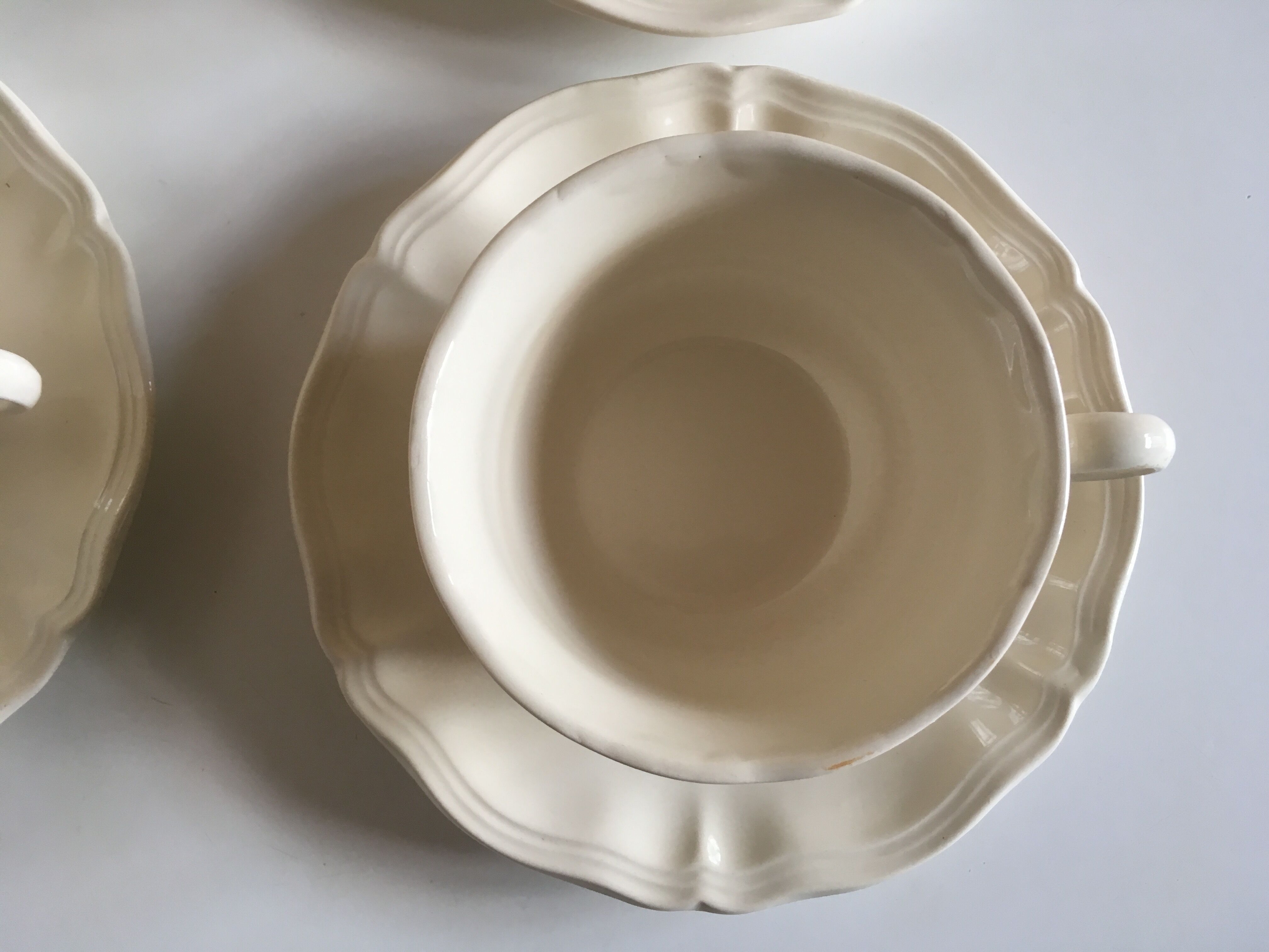 Set of 4 cups breakfasts in faience Sarreguemines ivory to godrons