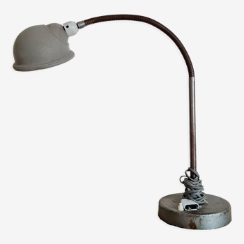 Antique articulated metal workshop lamp