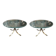 Pair of round coffee tables, glass, ca 1970