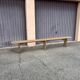 Pair of long benches in natural solid wood, French artisanal craftsmanship.