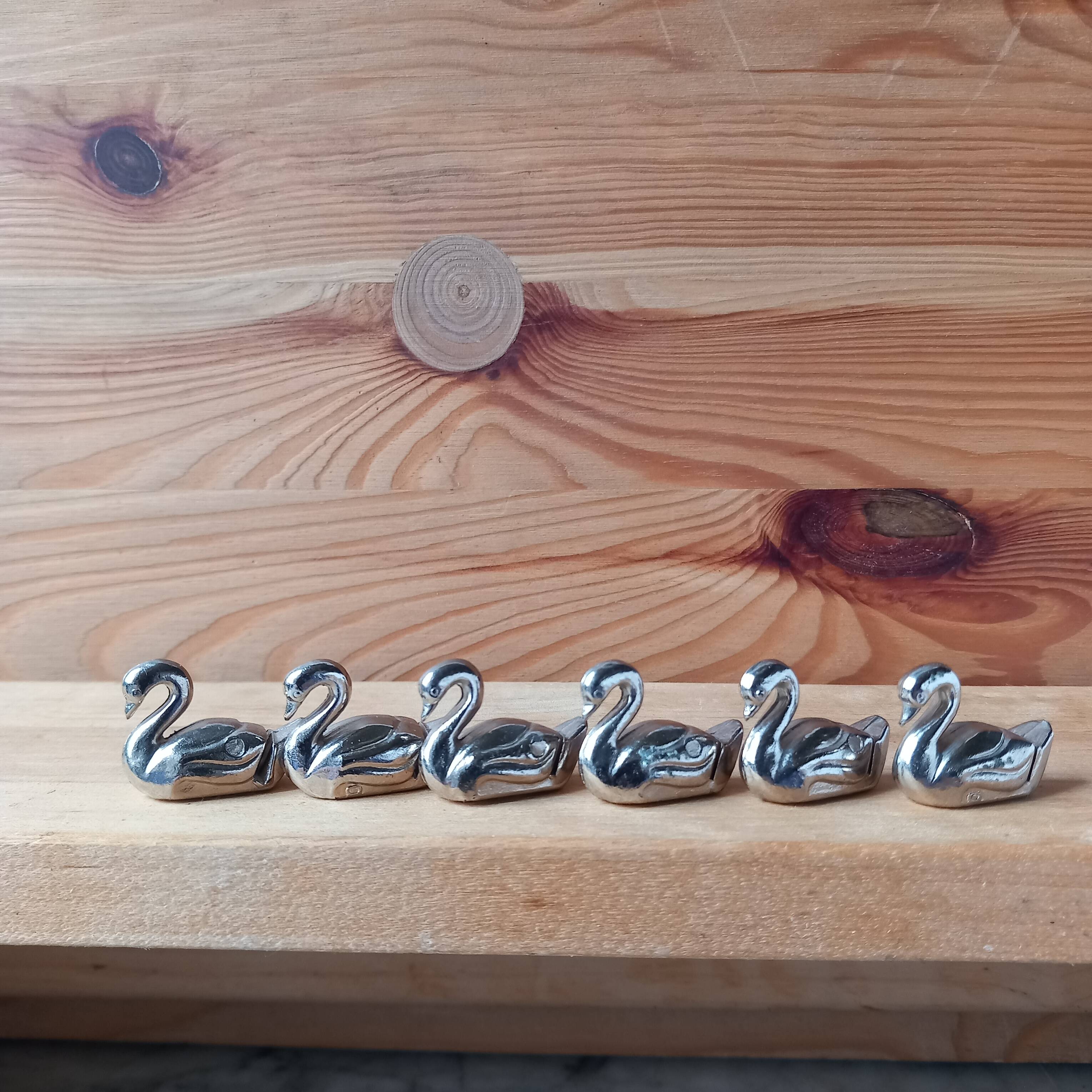 6 small swan metal name tags