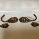 4 lion coat hooks in brass