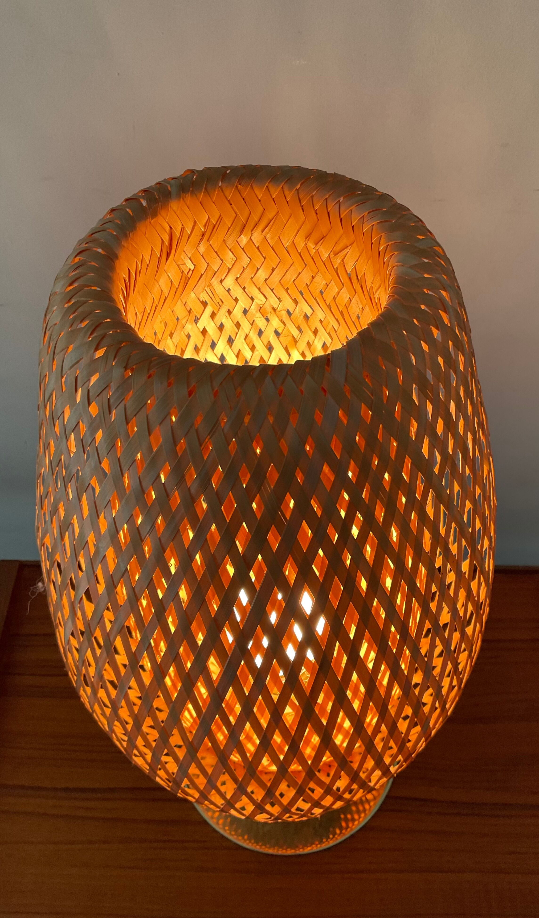 Design lamp in gold metal and wicker