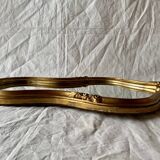 Large rococo mirror in gilded wood
