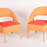 Mid century red and orange chairs. made in 1940