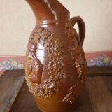 Beauvais sandstone pitcher decorated with a prizery