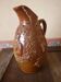 Beauvais sandstone pitcher decorated with a prizery