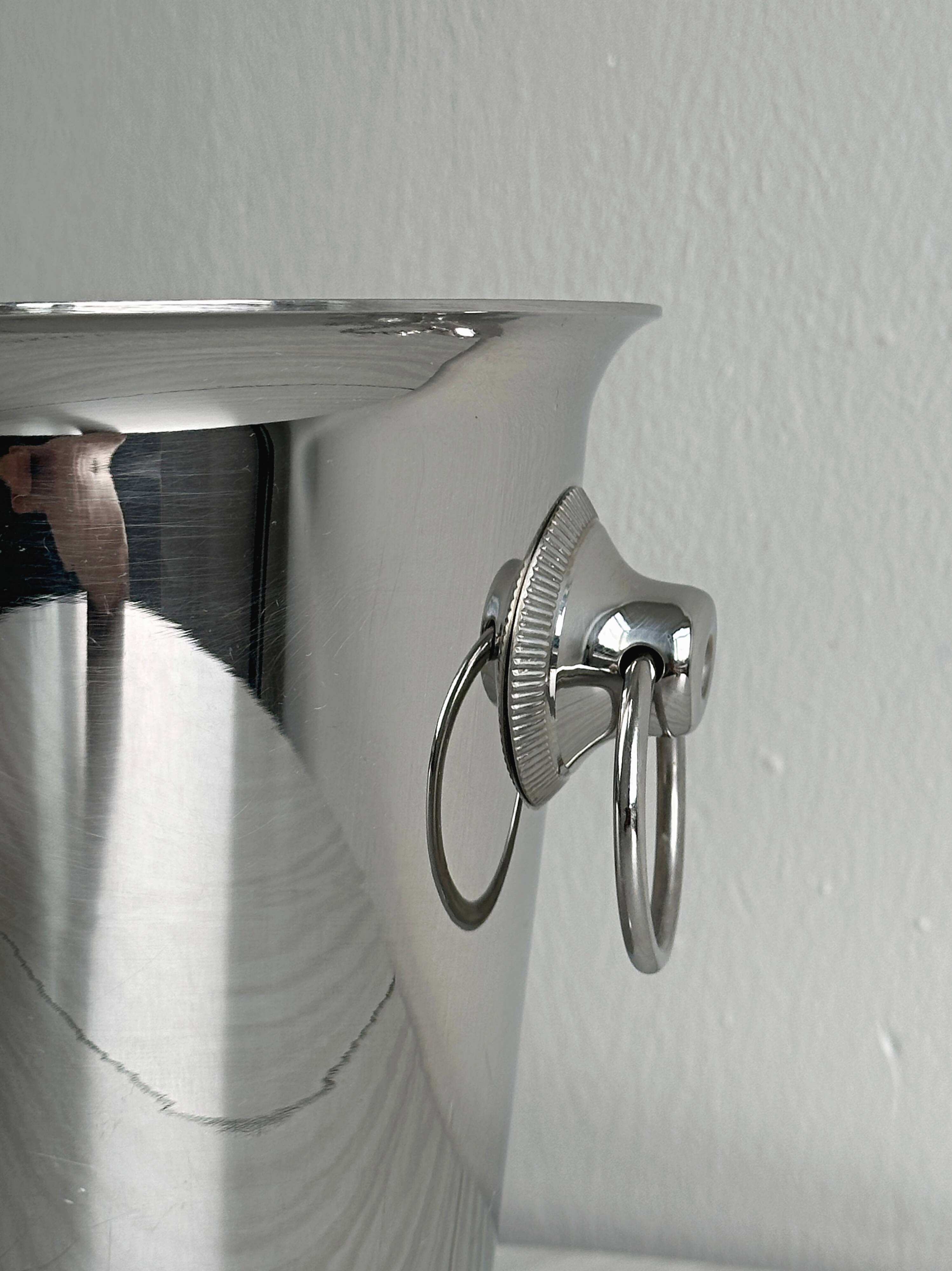 Shiny stainless steel champagne bucket