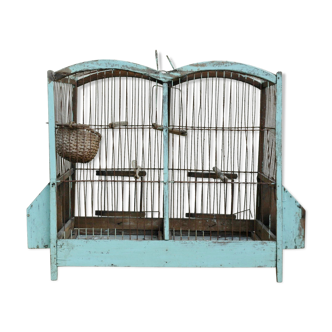 Ancient bird cage in wood and metal