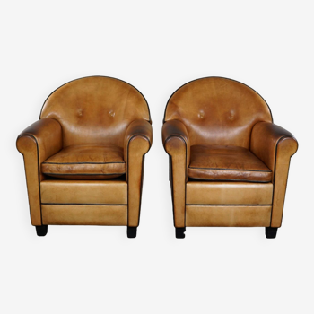 Set of two Bart van Bekhoven sheep leather design armchairs