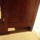 Antique chest of drawers with cross motifs, made entirely of solid walnut.