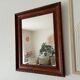 Antique carved wooden mirror from the 1940s/50s.