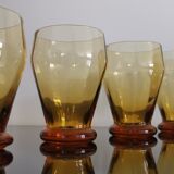 4 old amber colored glasses