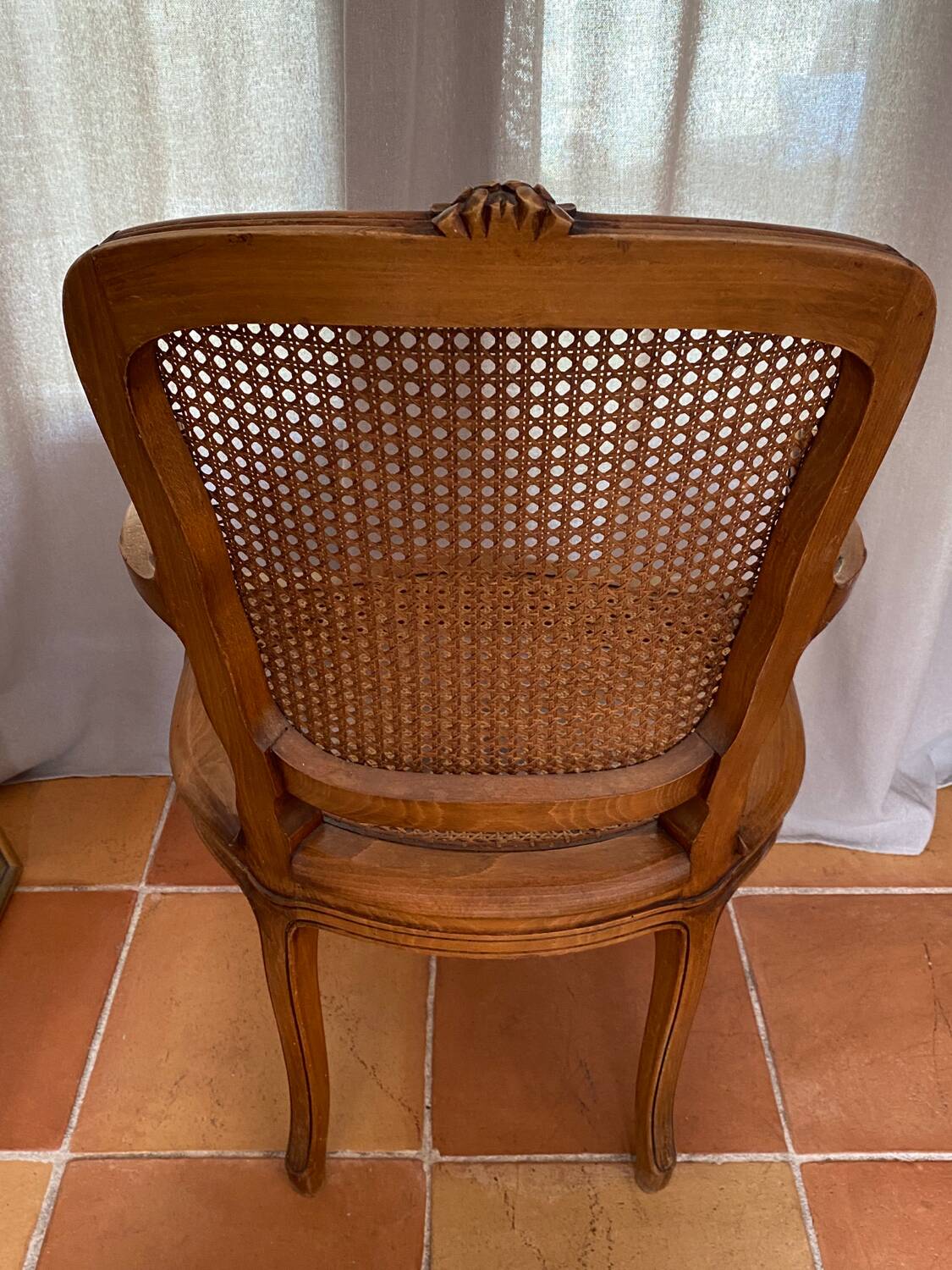 Louis XV style caned armchair