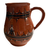 Terracotta ceramic carafe with geometric and white patterns