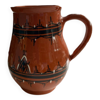 Carafe en céramique terracota à motifs géométriques et blanc