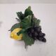Pair of fruit candle holders in Italian majolica.