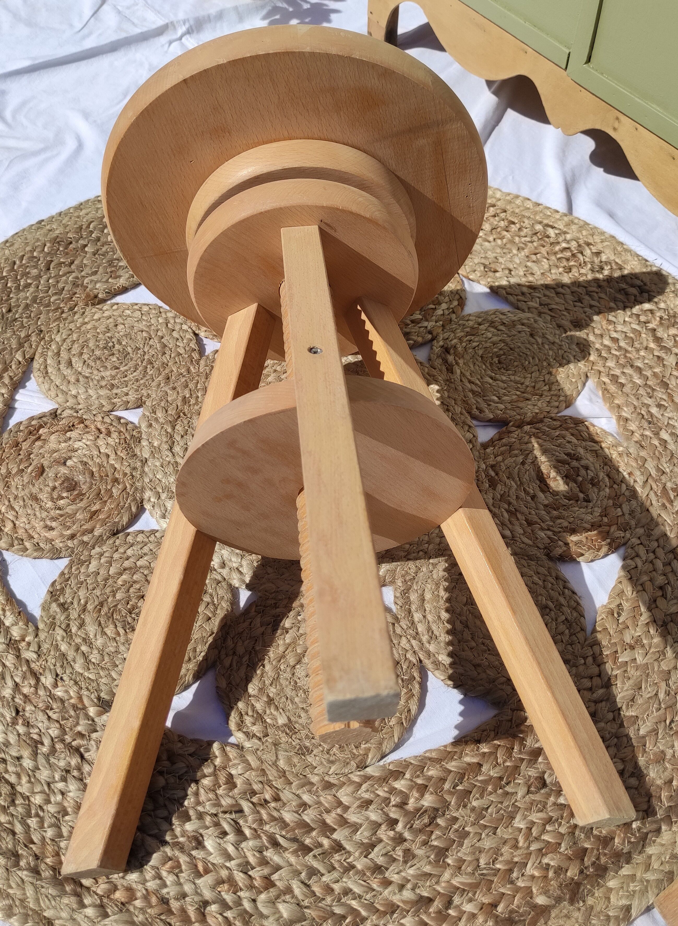 Vintage wooden stool with screws