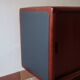 Teak enfilade, sliding doors, black faux leather top, 1970s.
