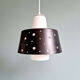 A pair of Scandinavian pendant lights in white opaline and black lacquered metal, 1960.