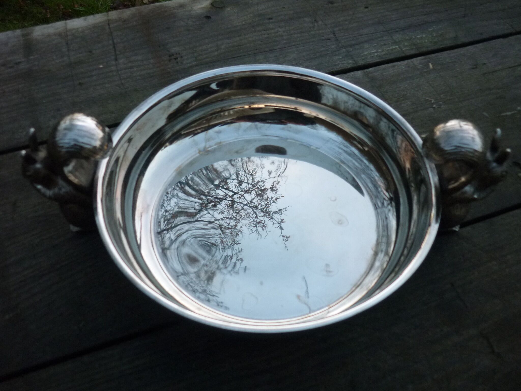 Silver metal dish with squirrels