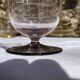 Antique Art Deco engraved glass, silvered rim and base.