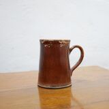 Vintage pitcher in glazed terracotta