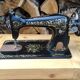 Old Singer sewing machine on pedestal