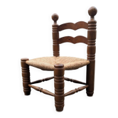 Low straw chair