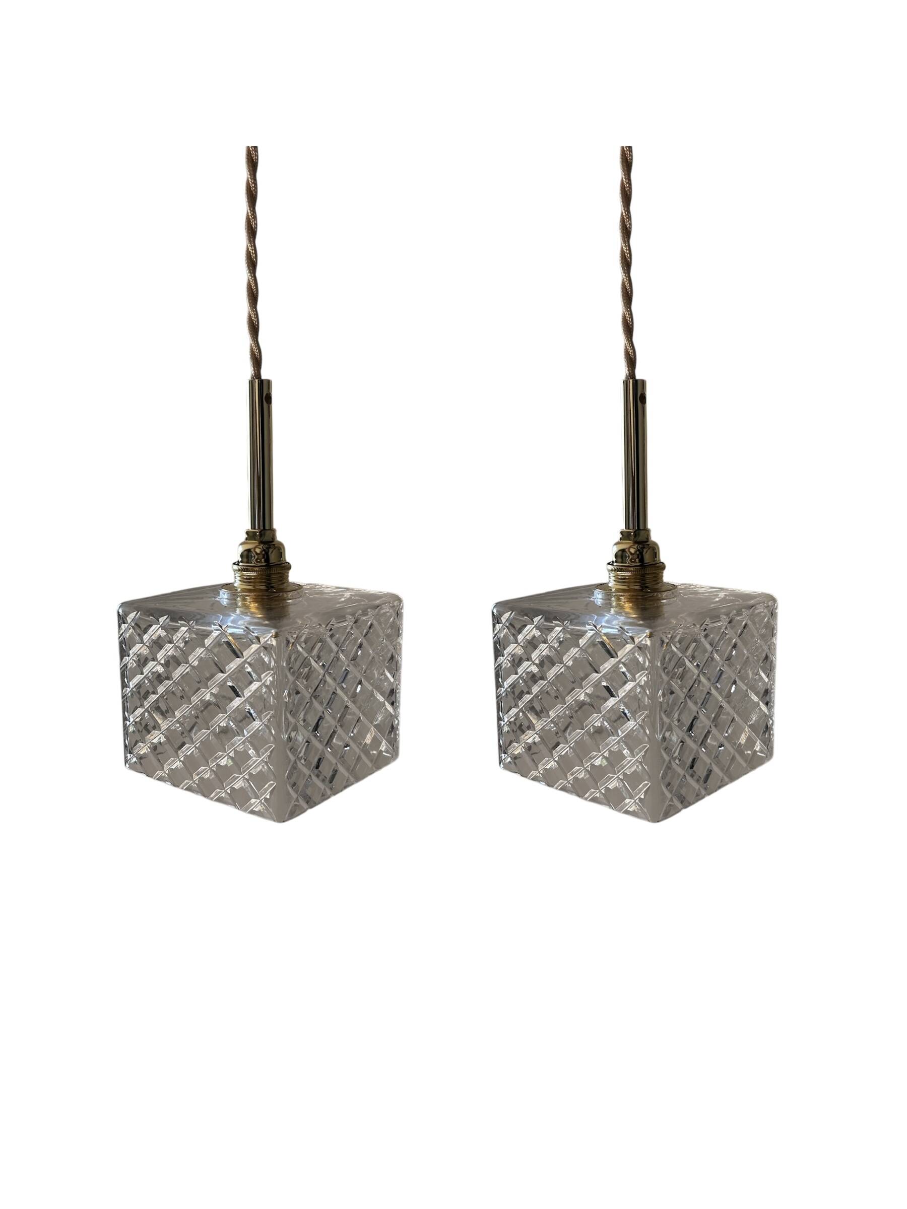 Pair of chiseled glass portable lamps