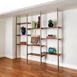Tension pole free standing rose gold aluminum Omni wall unit by George Nelson