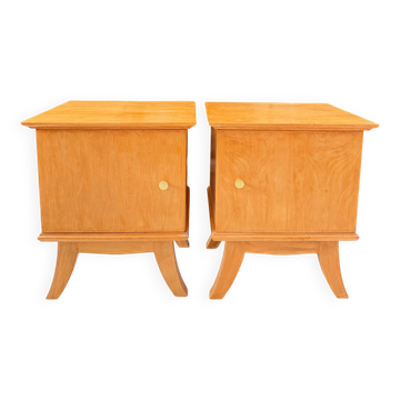 Vintage bedside table with tapered legs.