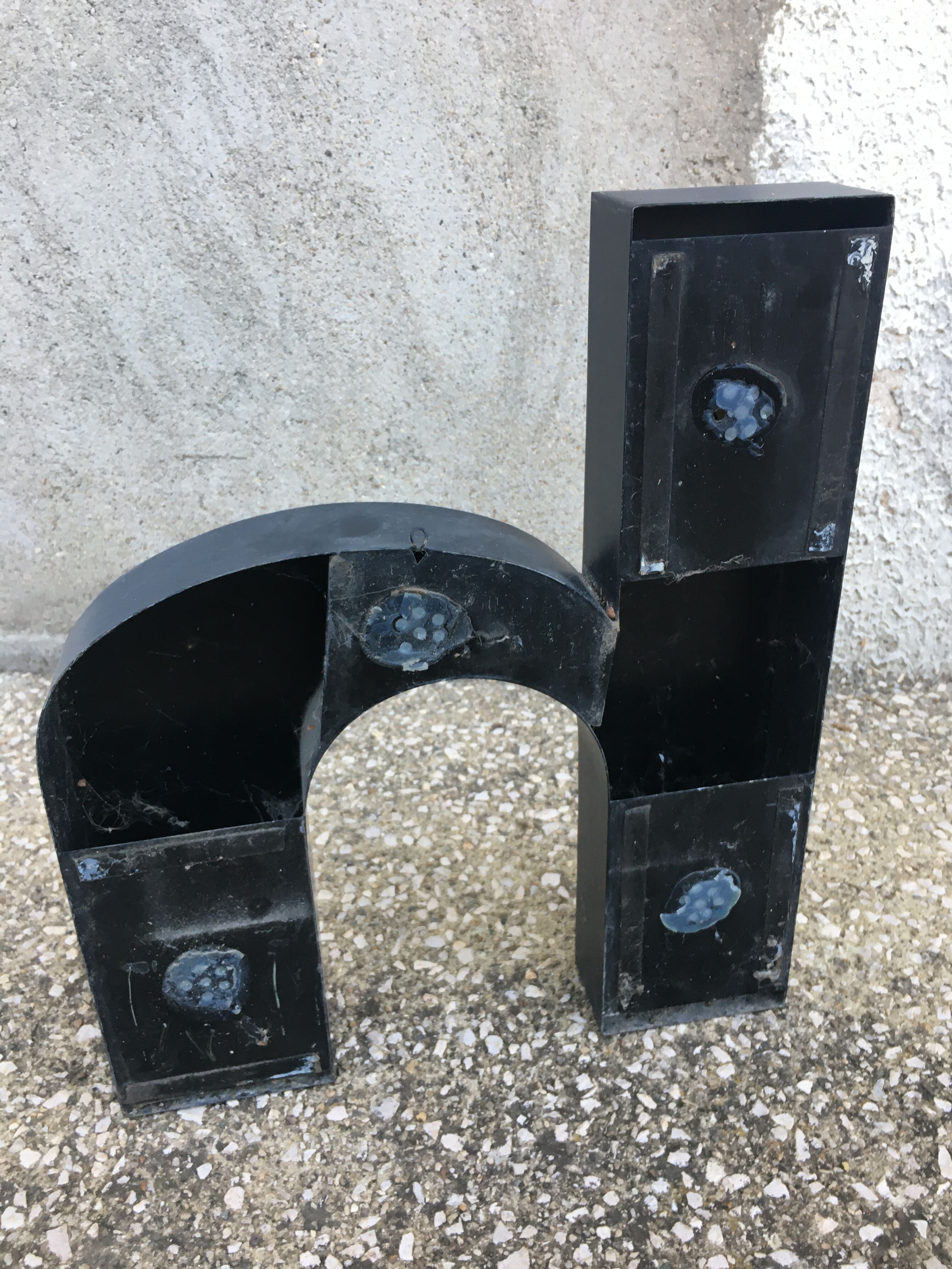 Vintage metal sign letter