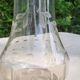 Pair of crystal and pewter jugs