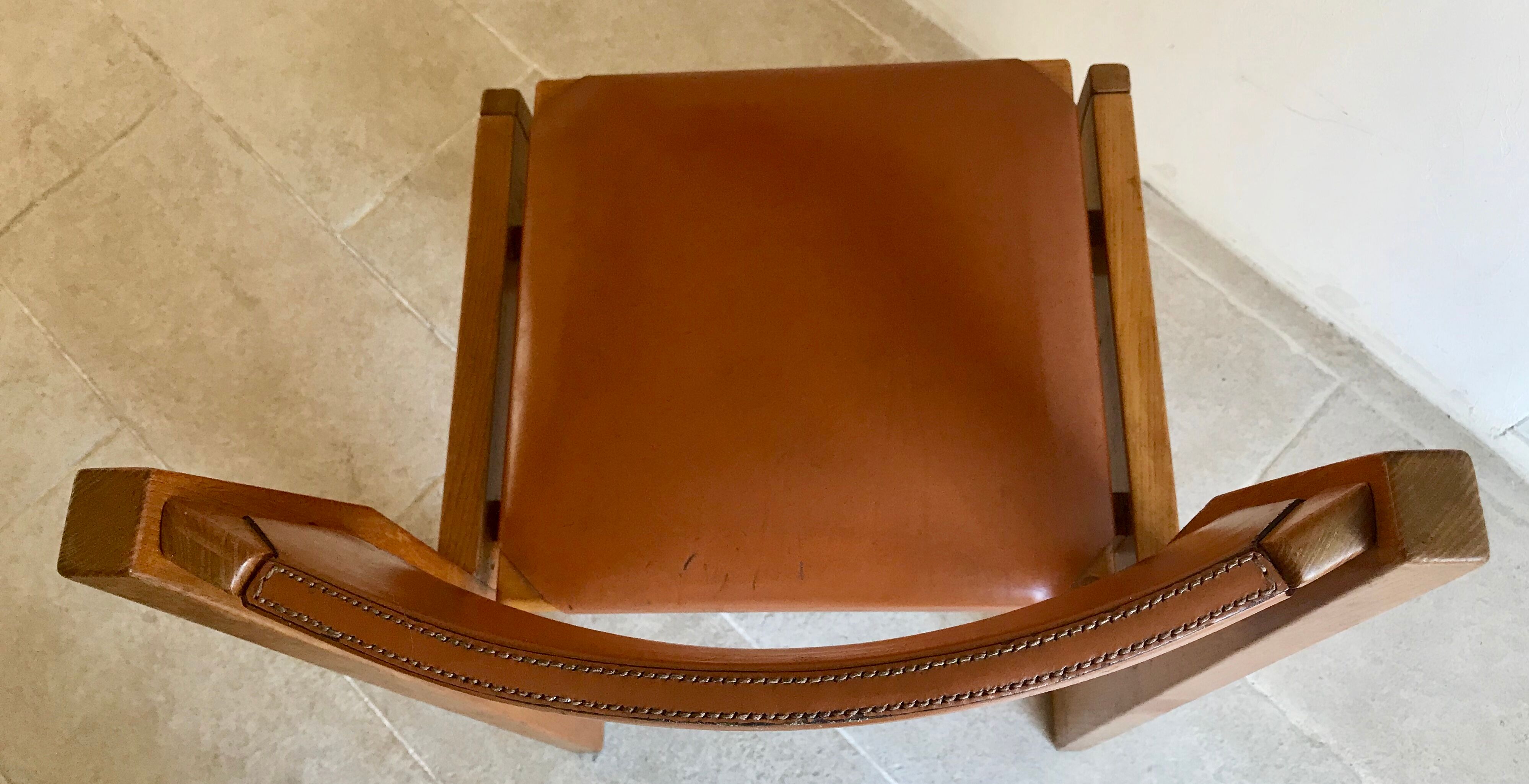 Leather and wood chair 70's