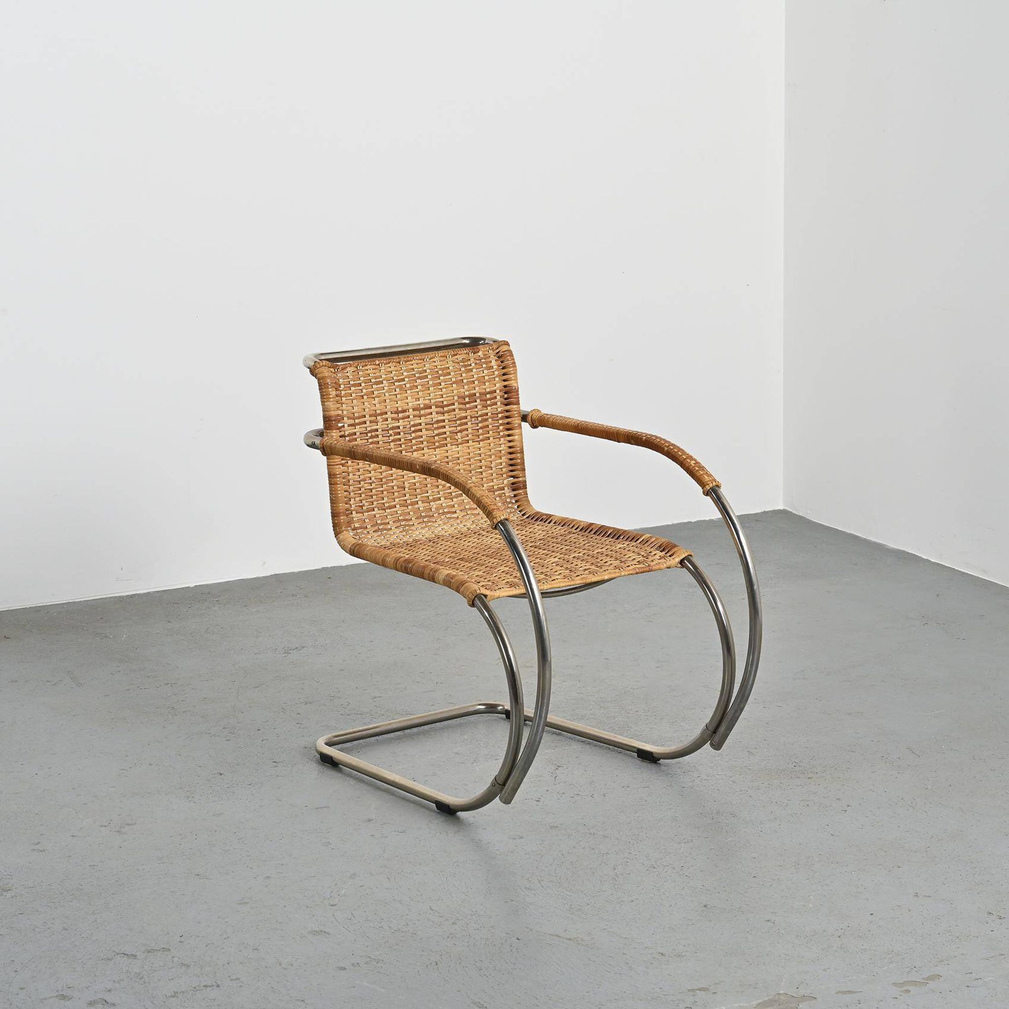 D42 tubular steel and cane armchair, Tecta, Germany, circa 1980
