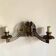 Art Nouveau style brass double piano wall lamp
