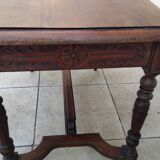 Antique desk or small table in solid carved wood