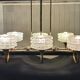 Eight-light chandelier in gilded brass and blue, 1950.