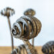 Set of six hammered Art Deco coat hooks