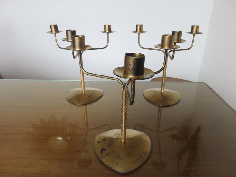 Series of 3 70s gold metal candlesticks