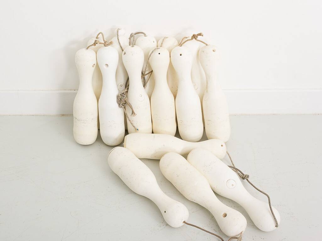 15 vintage bowling pins on nylon lifting cords