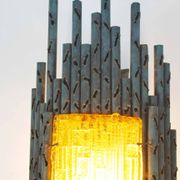 brutalist rough iron and glass wall sconce by Marcello Fantoni