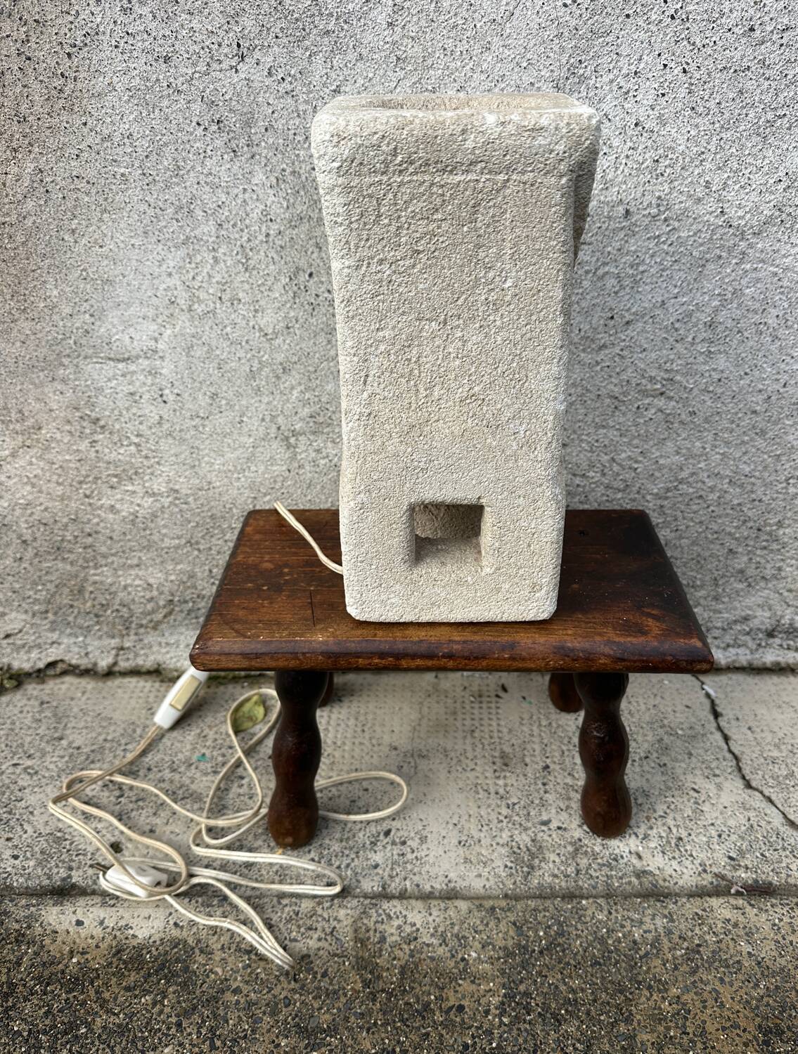 Anthropomorphic stone table lamp brutalised by Albert Tormos.