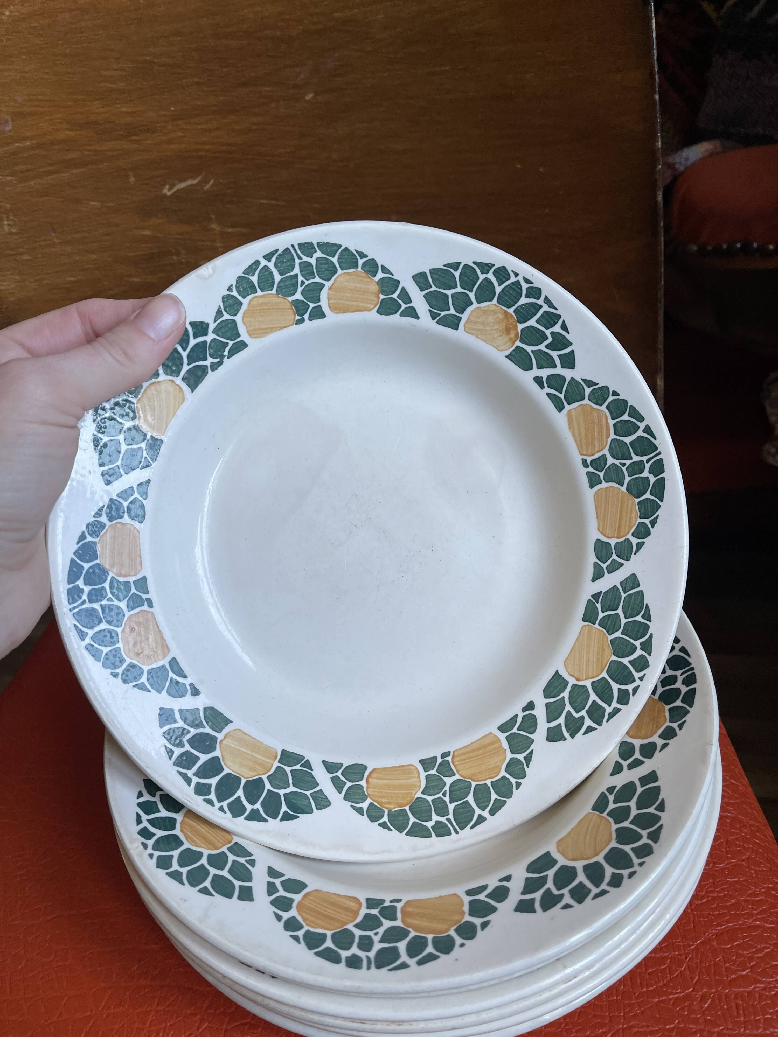 Lot of 8 Givors plates in antique earthenware.