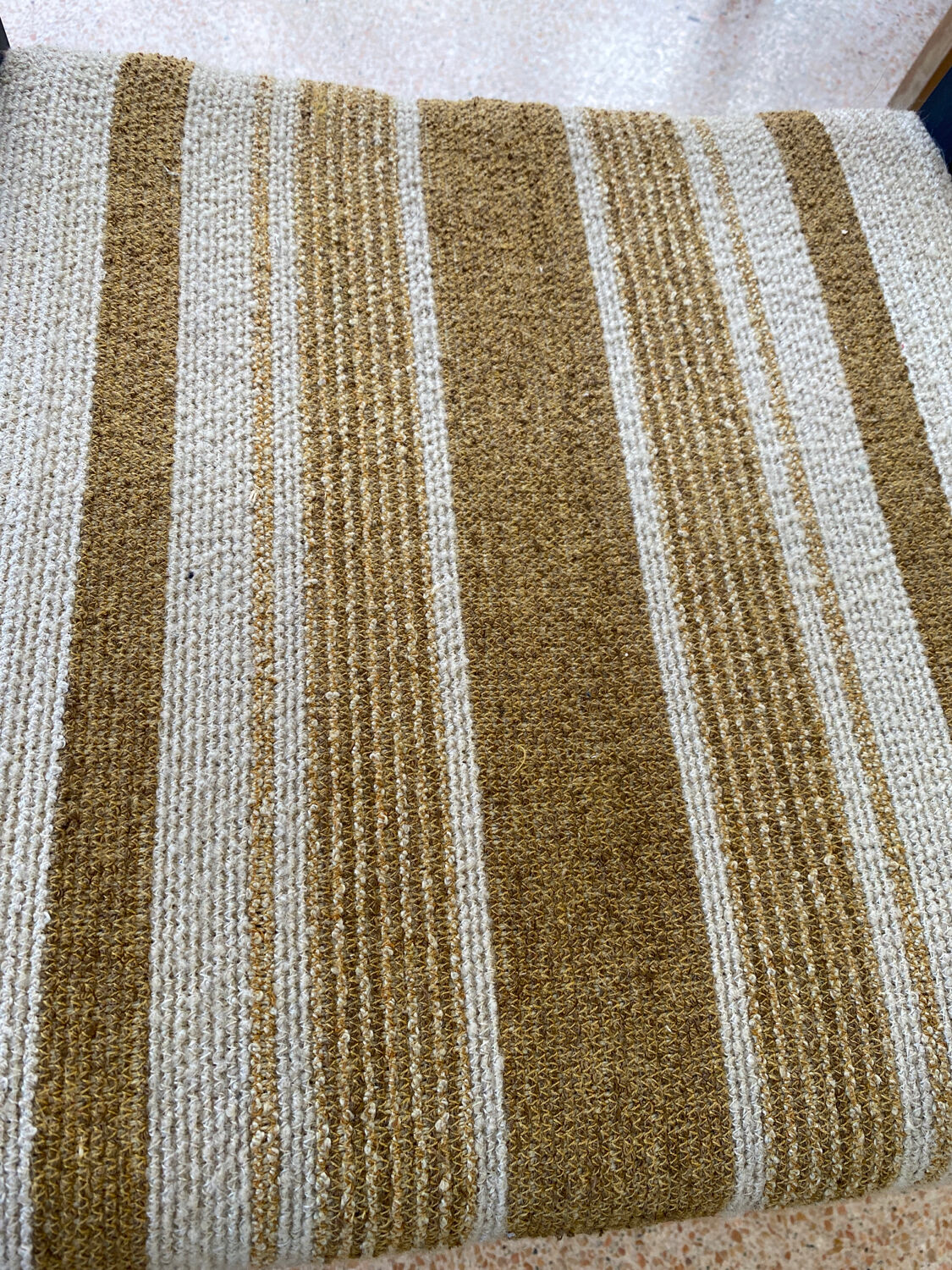 2 wooden chairs and vintage fabric