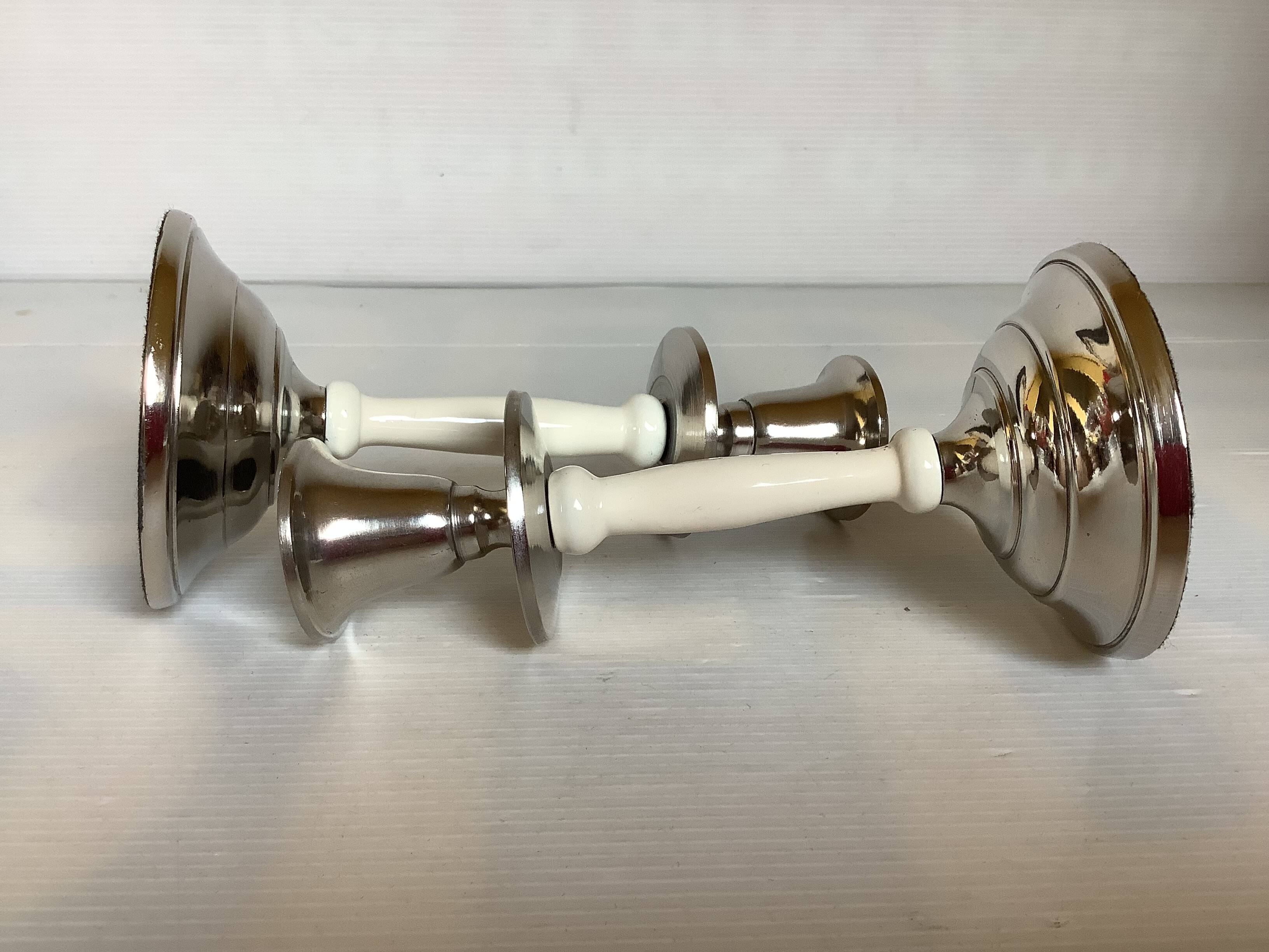 Pair of silver metal candlesticks