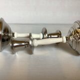 Pair of silver metal candlesticks