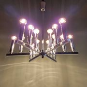 Chrome metal Space Age chandelier, 18 light points, 1970.